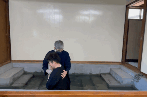 Baptizing a new brother here