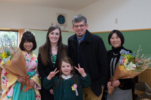 With some of Madeleine's teachers after her graduation from kindergarten